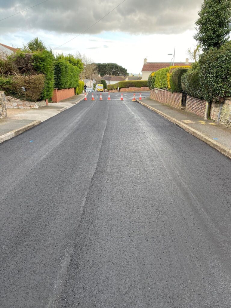 A newly resurfaced residential road, completed by Hazell & Jefferies.