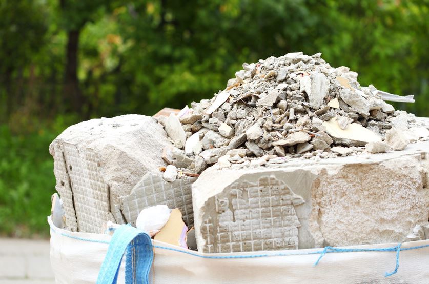 An industrial plastic bag filled with recycled aggregates.